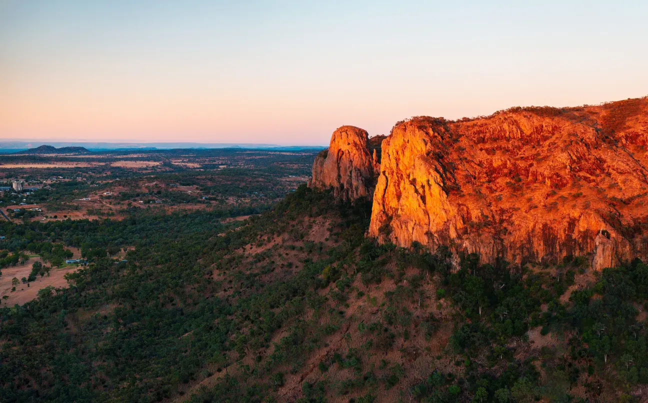Landscape photo of Springsure escarpments in golden sunlight.